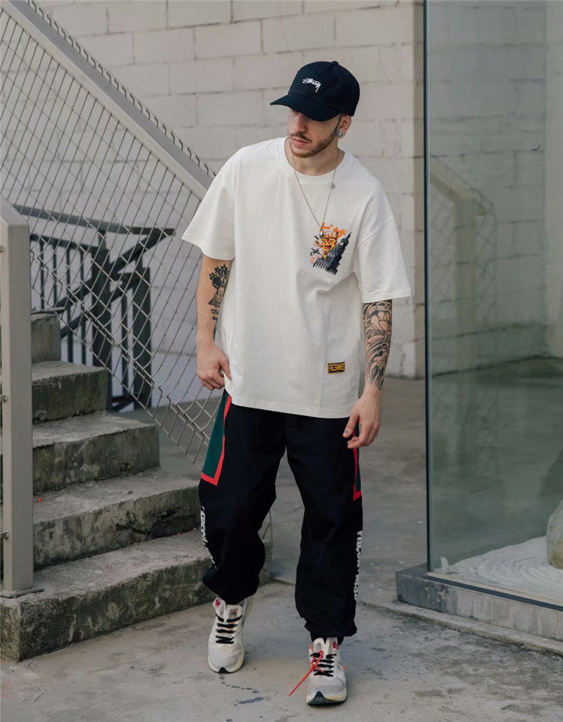 Neues Kurzarm-T-Shirt mit europäischem und amerikanischem Street-Hip-Hop-Print – ein trendiges Shirt für Männer und Frauen - Shopteufel