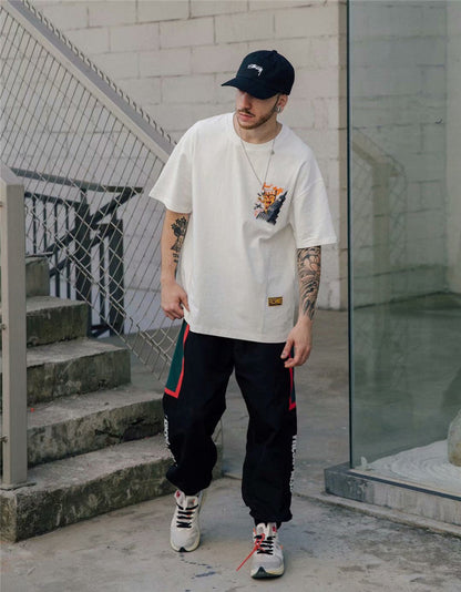 Neues Kurzarm-T-Shirt mit europäischem und amerikanischem Street-Hip-Hop-Print – ein trendiges Shirt für Männer und Frauen - Shopteufel